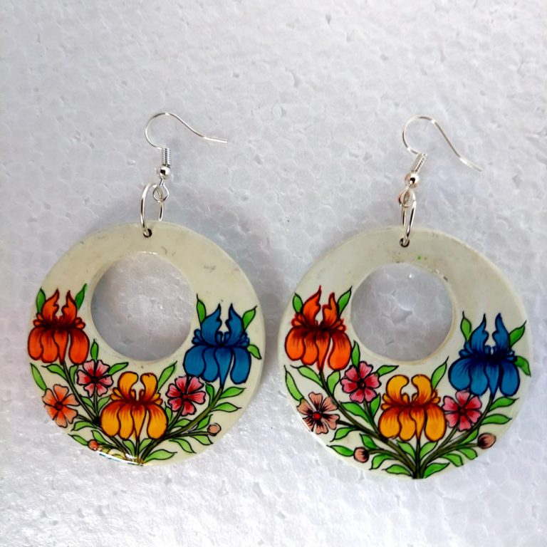 white flowry earrings