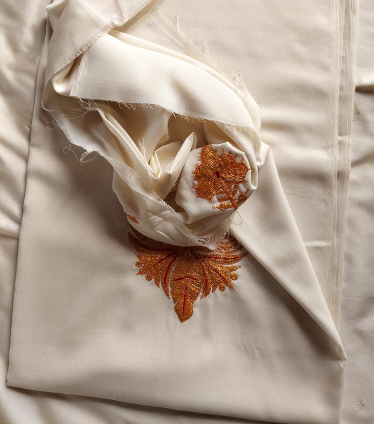 white tilla suit summer cool