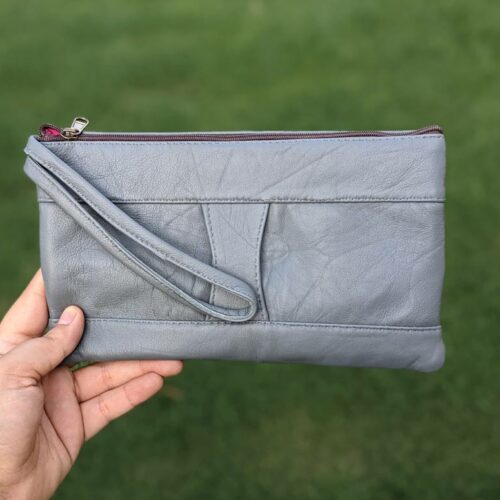 grey leather bag