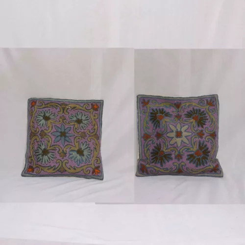 pair of purple cushion cover
